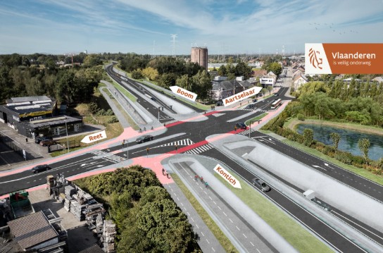 Luchtfoto van een kruispunt met wegen naar Boom, Aartselaar en Kontich, inclusief fietspaden en verkeerslichten. (vergroot foto)